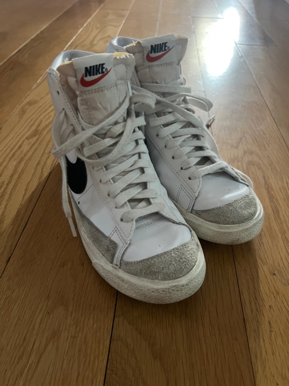 Nike High-Top Sneakers in White and Black with Red Logo